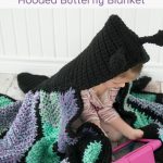 Crochet pattern for a hooded butterfly blanket with a free video tutorial.