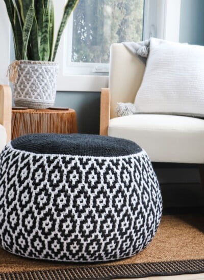 A Granite Ridge Floor Pouf in a living room.