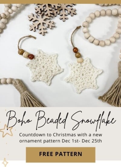 A free crochet pattern for a beaded snowflake with tassels.