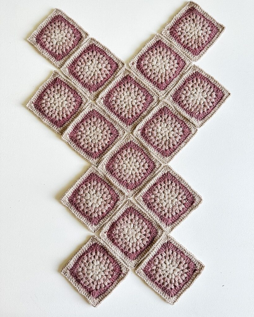 Image of granny square bag before it is seamed together.