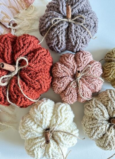 A group of crochet pumpkins.
