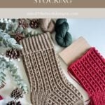 Two crocheted Christmas stockings, one tan and one red, are displayed with yarn, crochet hooks, pinecones, greenery, and a granny square ornament on a light surface. Text above reads "Snuggle Season Stocking.