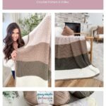 A woman holds a striped crochet blanket in neutral colors, featuring a subtle granny square ornament. The blanket is draped over a chair, with skeins of matching yarn in coordinating shades displayed below.