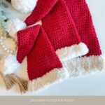 Three red crochet Santa hats with white fluffy trim and pom-poms are displayed alongside decorative beads, greenery, and a festive granny square ornament. Text reads "Santa Hat" and website information.