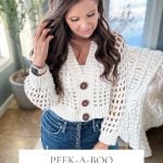 Woman wearing a white crochet cardigan with large buttons, standing indoors. Text overlay reads: "Peek-a-boo Crochet Mesh Top Cardigan Pattern & Video Sizes XS-5X.
