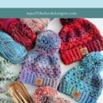 Three colorful Granny Stitch Hats with pom-poms are displayed alongside matching yarn skeins, crochet hooks, and a wooden tray on a white surface.