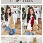 A woman displays Loopy Crochet Trees in various colors and sizes, arranging the decorative trees on a surface in front of a stone wall.