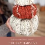 A person holds a stack of three crocheted Harvest Pumpkins in cream and orange yarn, with twine stems and strands, showcasing a charming chunky harvest pumpkin crochet pattern.