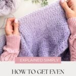 Hands holding a purple knitted fabric with yarn, a leafy plant nearby, and text that reads "How to Get Even Tension As a Beginner"—perfect for those curious about what is crochet and seeking tips for smooth, even stitches.