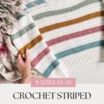 A hand holds a crocheted striped sweater in white, mustard, pink, and teal with yarn and flowers nearby. Reminiscent of a mosaic crochet blanket. Text reads “9 sizes XS-5X. Crochet Striped Sweater Pattern. mjsoffthehookdesigns.com”.