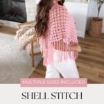 Woman wearing a pink crochet poncho and white hat stands indoors near a fireplace. Text reads: "Shell Stitch Poncho Pattern—free crochet poncho pattern available in multiple sizes. mjsoffthehookdesigns.com.