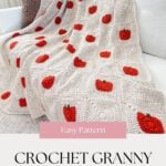 A cream-colored crochet granny square blanket with red strawberry motifs is draped over a white sofa. Text reads “Easy Pattern: Crochet Granny Square Blanket” and “mjsoffthehookdesigns.com”. Perfect for cozy inspiration, this design pairs beautifully with other seasonal favorites like the popular crochet pumpkin blanket pattern.